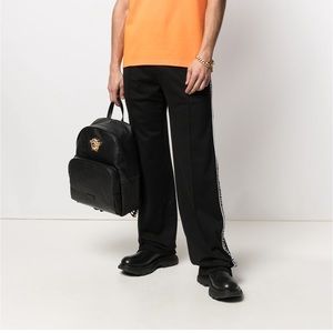 Versace embroidered logo track pants. Size: Large. Color: black/white.